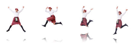 Scottish man dancing on whiteの写真素材