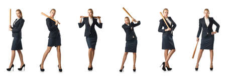 Businesswoman with baseball bat on whiteの写真素材