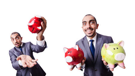 Businessman with piggybank on whiteの写真素材