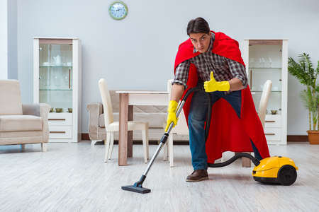 Super hero cleaner working at homeの写真素材