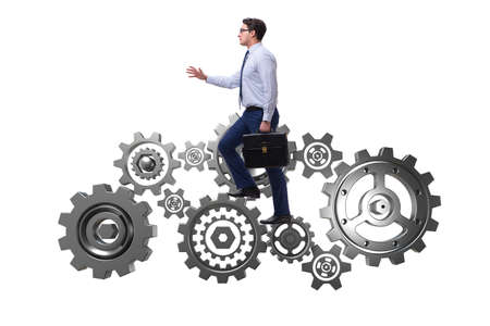Businessman in teamwork concept with cog wheelsの写真素材