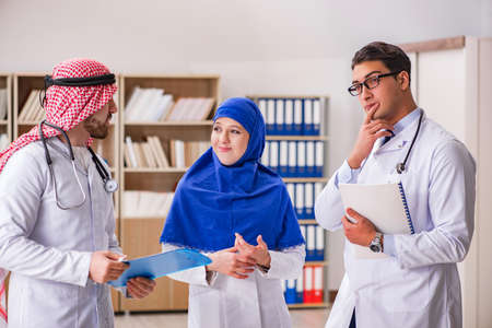 Diversity concept with doctors in hospitalの写真素材