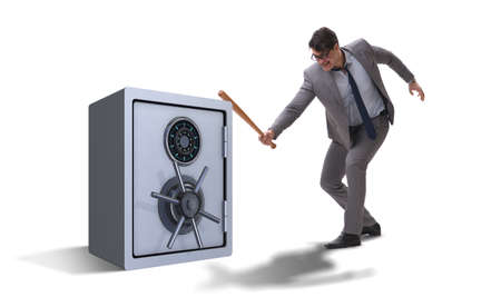 Angry man with baseball bat hitting money safeの写真素材