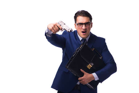 Businessman with gun isolated on whiteの写真素材