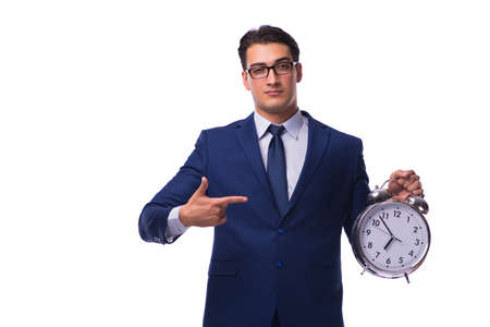 Businessman with alarm clock isolated on whiteの写真素材