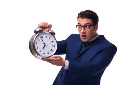 Businessman with alarm clock isolated on whiteの写真素材