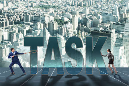 Businesswoman and businessman in task concept