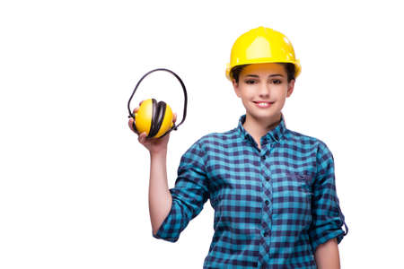 Young woman in industrial concept isolated on whiteの写真素材