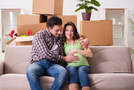 Young couple of man and pregnant wife expecting babyの写真素材