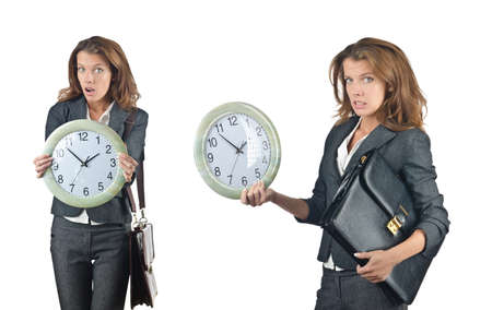 Businesswoman with clock isolated on whiteの写真素材