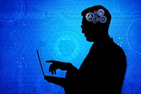 Artificial intelligence concept with man and laptopの写真素材