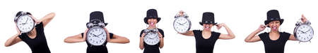Young woman with clock isolated on white