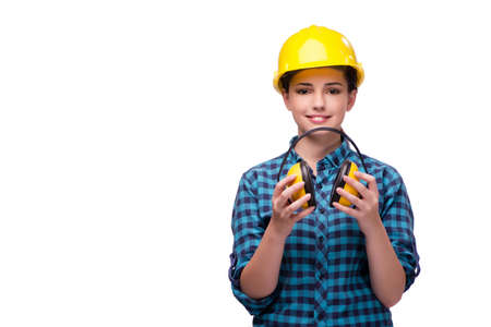 Young woman in industrial concept isolated on whiteの写真素材