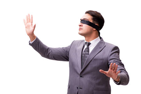 Blindfolded businessman isolated on whiteの写真素材