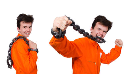 Young inmate with chains isolated on the white
