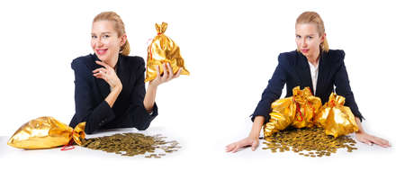 Woman with coins and golden sacksの写真素材