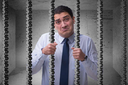 Man trapped in prison with dollarsの写真素材