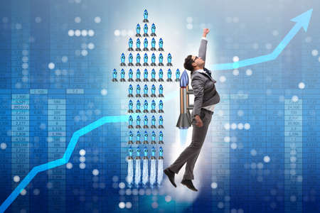Businessman on rocket in trading concept
