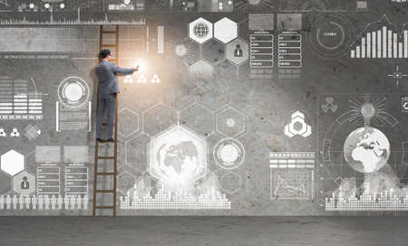 Man on the ladder in data management concept