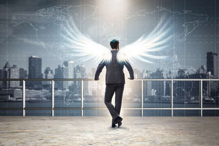 Angel investor concept with businessman with wingsの写真素材