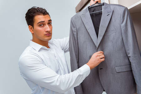 Businessman dressing up for workの写真素材