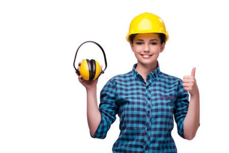 Young woman in industrial concept isolated on whiteの写真素材