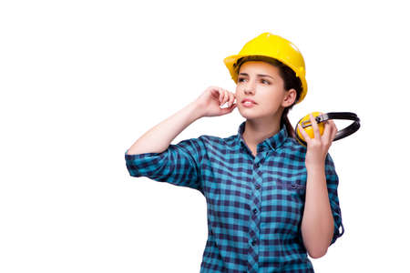 Young woman in industrial concept isolated on whiteの写真素材