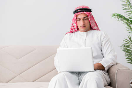 Young arab businessman in business conceptの写真素材