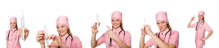 Woman doctor with syringe on whiteの写真素材
