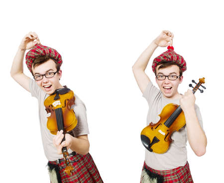 Funny scotsman with violin on whiteの写真素材
