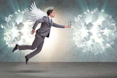 Angel investor concept with businessman with wingsの写真素材