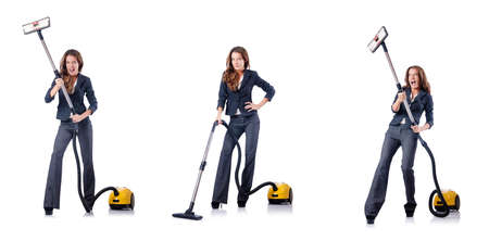 Woman cleaning with vacuum cleanerの写真素材