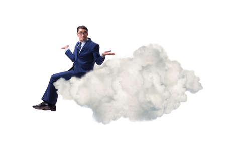 Businessman sitting on the cloud in motivitation conceptの写真素材