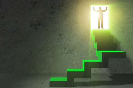 Young businessman climbing career ladderの写真素材