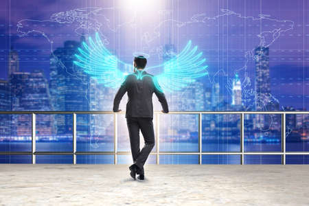 Angel investor concept with businessman with wingsの写真素材
