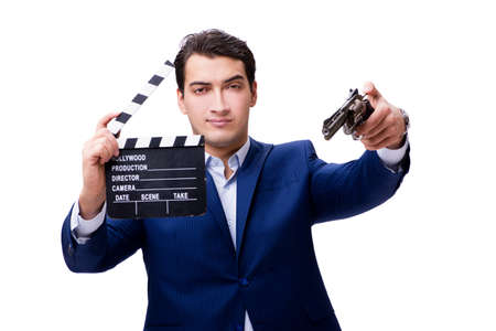 Handsome man with movie clapper isolated on whiteの写真素材