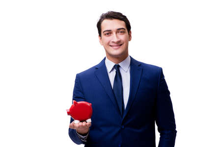 Handsome man with piggybank isolated on whiteの写真素材