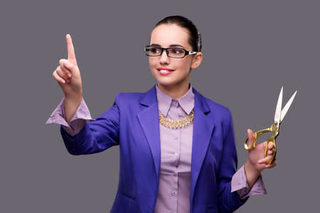 Woman tailor pressing virtual buttonの写真素材