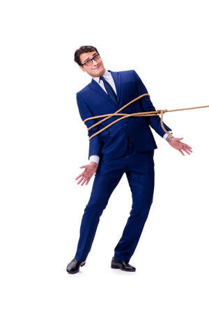 Businessman caught with rope lasso isolated on whiteの写真素材