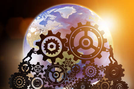 Businessman in teamwork concept with cogwheelsの写真素材