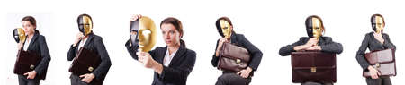 Woman with mask in hypocrisy conceptの写真素材