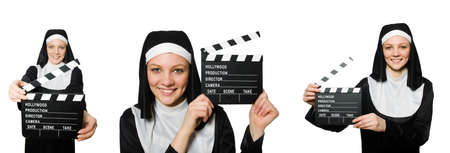 Nun with movie board isolated on whiteの写真素材
