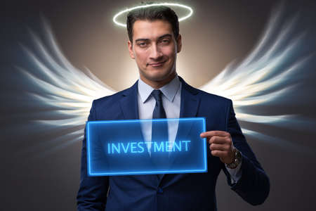 Angel investor concept with businessman with wingsの写真素材