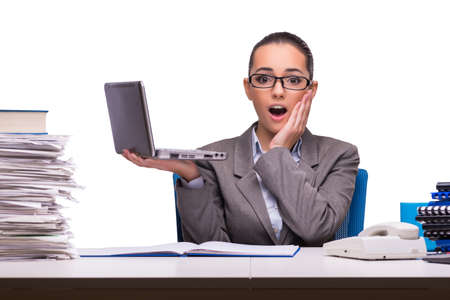 Young businesswoman in office isolated on whiteの写真素材