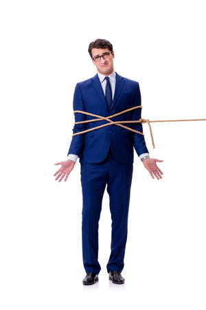 Businessman caught with rope lasso isolated on whiteの写真素材