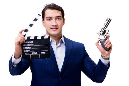 Handsome man with movie clapper isolated on whiteの写真素材
