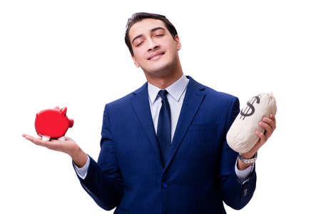 Handsome man with piggybank isolated on whiteの写真素材