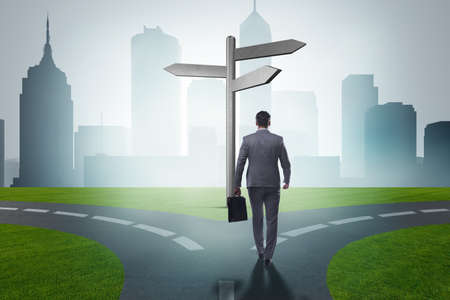 Businessman in difficult choice conceptの写真素材