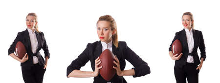 Preety office employee with rugby ball isolated on whiteの写真素材