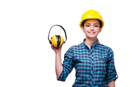 Young woman in industrial concept isolated on whiteの写真素材